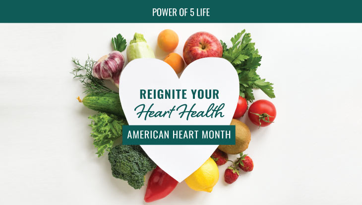 a heart surrounded by veggies to recognize American Heart Month